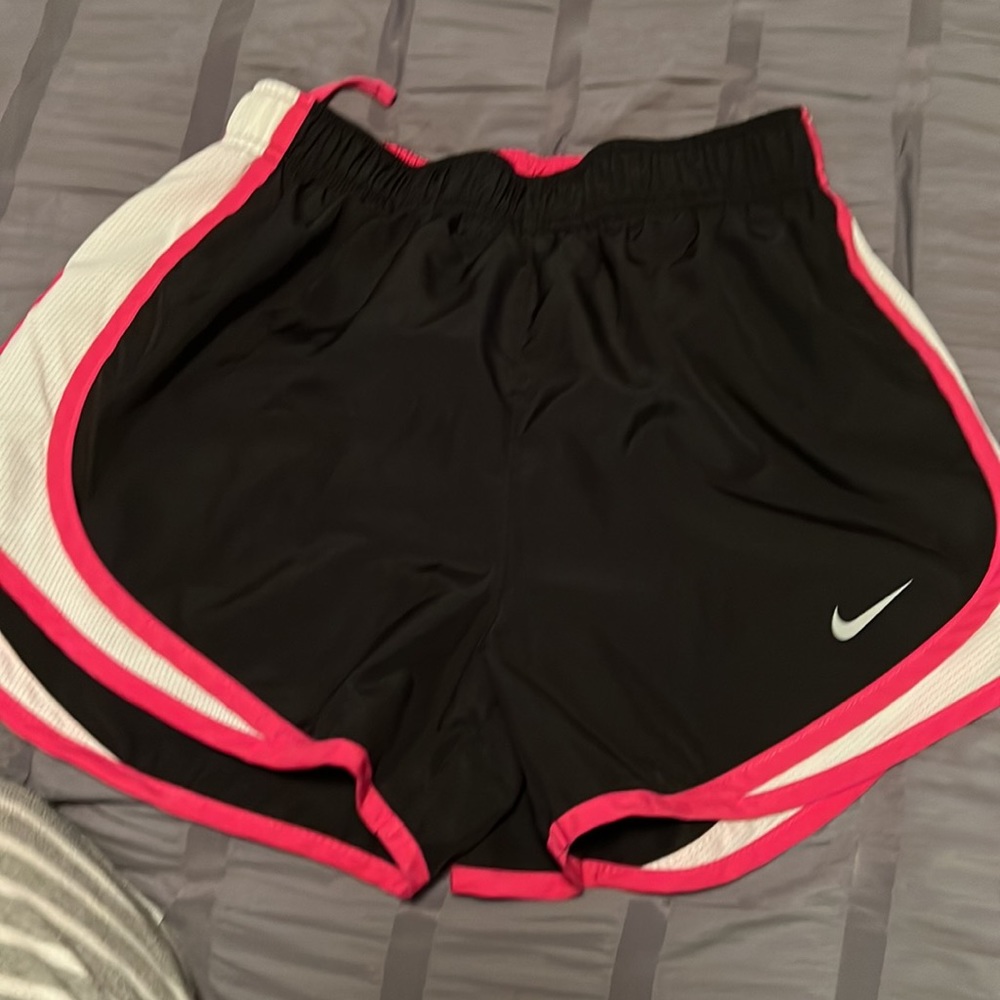Two pair of Nike running shorts. Xs